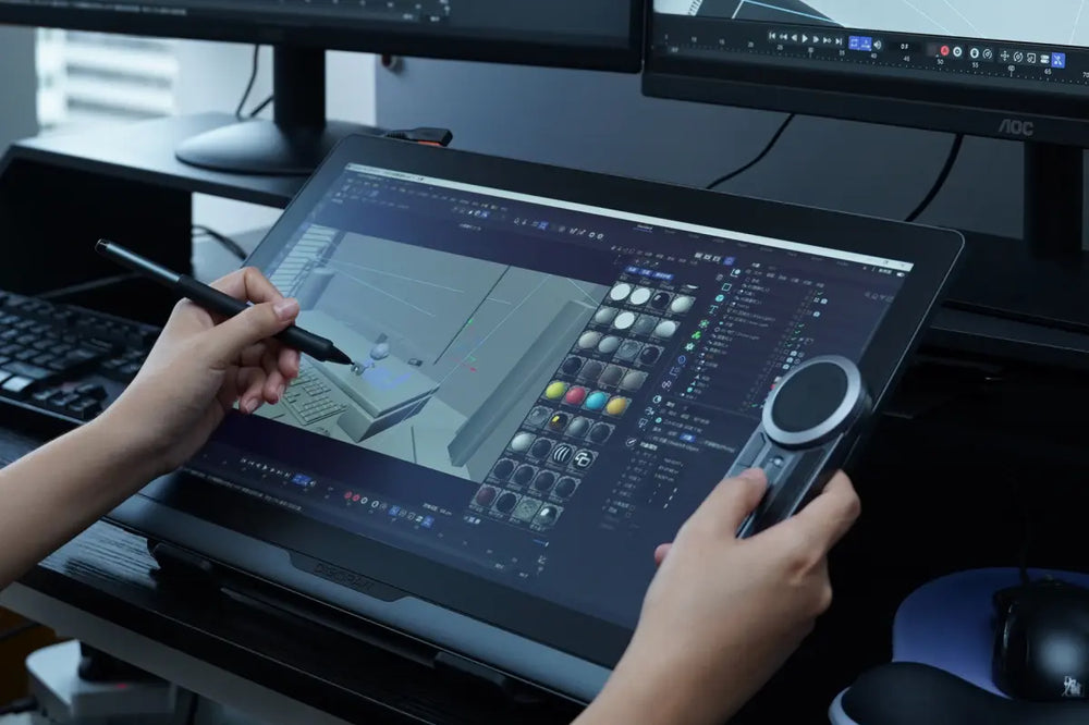 Professional artist using the DIGIDRAW Turing Pro 19 pen display and K30 remote control for 3D digital modeling.